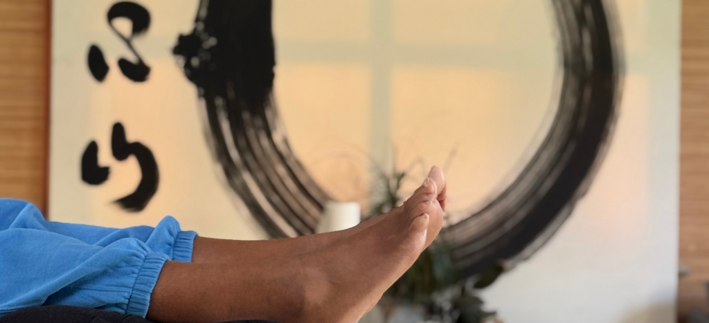 a patients feet as they relax during acupuncture at The Get Well Clinics.