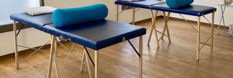 Img-home-matters-02 The Get Well Clinics, Paddington/Royal Oak, West London. Two blue treatment tables set up in the clinics with bolsters.